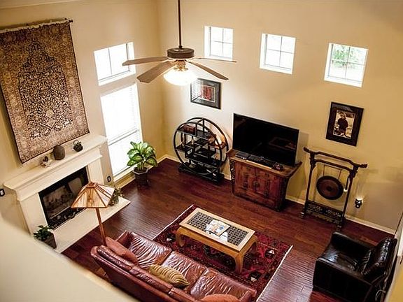 Dramatic vaulted ceilings in this view from second floor stairway.