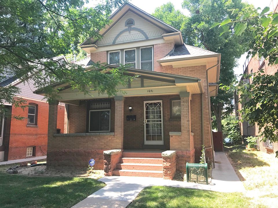 View from Cook Street. Separate entry for basement unit is on the right side of the house. Laundry is in the foyer, through the front door shown here.