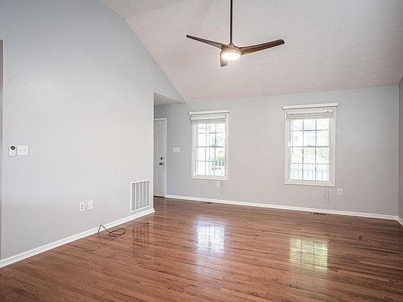 Living Room. There is a coat closet opposite front door (not shown)