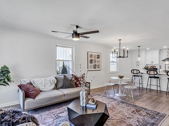 Living room opens up to dining area and kitchen