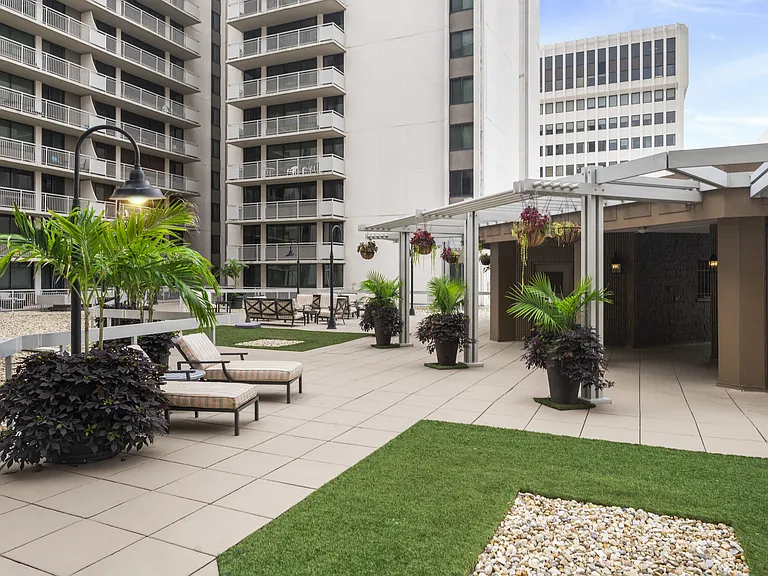 Beautifully Landscaped Courtyard with Seating and Sunning Areas