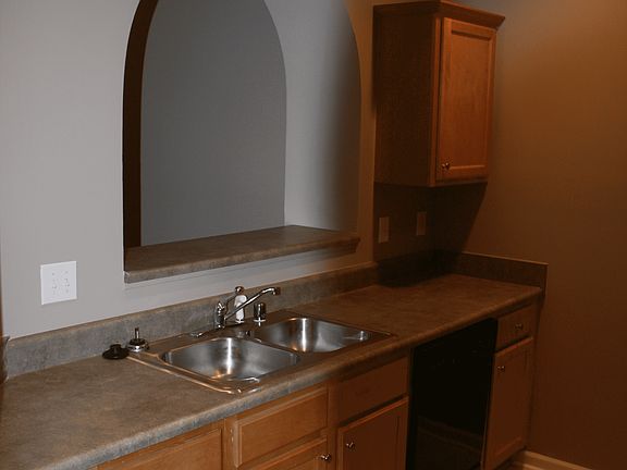 Galley Kitchen with View of Great Room