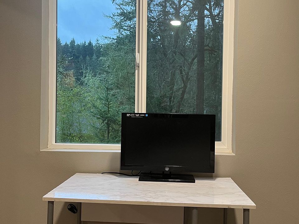 View of trees/butte from bedroom window.