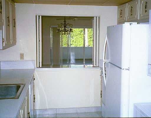 KITCHEN LOOKING INTO DINING/LIVING ROOM