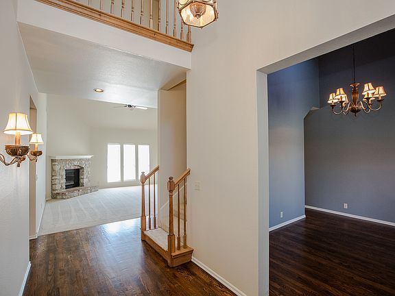 Foyer opens to Formal Dining and Family Room.