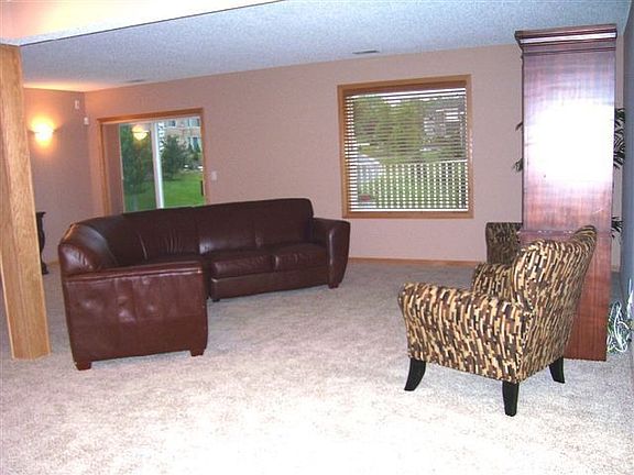 Finished lower walkout with full windows and new carpet