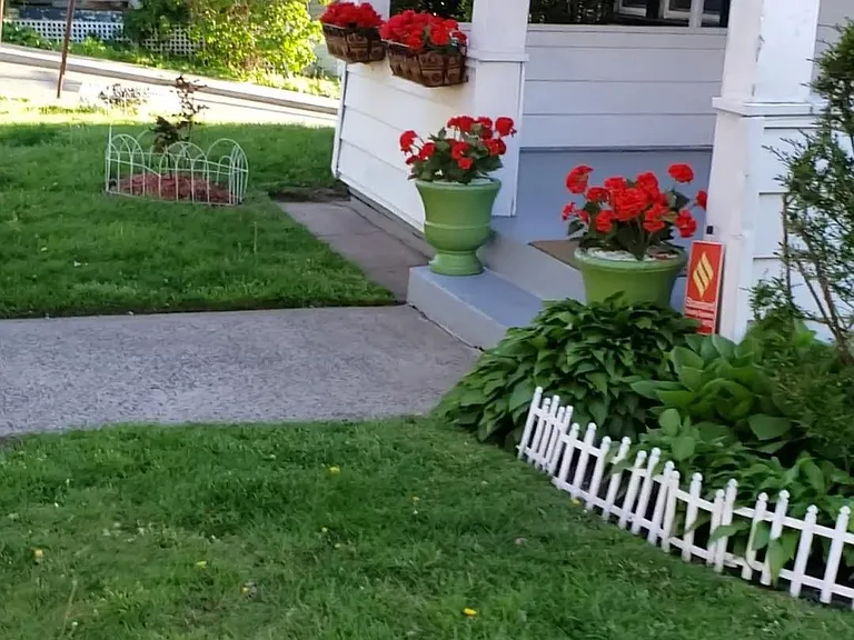 View of front porch and yard