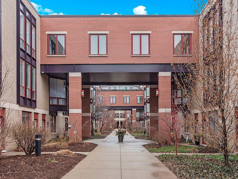 Highly coveted townhouse in the Daily News Townhome community, within walking distance to all of the