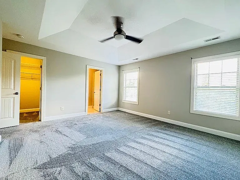 Master bedroom windows face the huge backyard