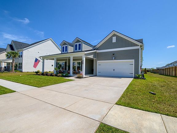 Front View with Easement on all three sides of the property. Not close to your neighbors!