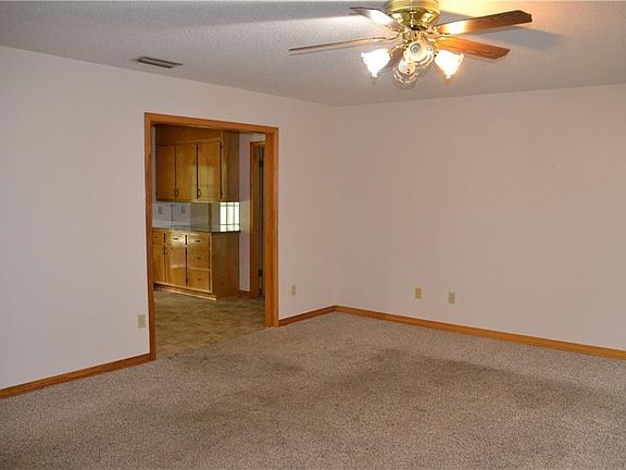 Living room looking into kitchen