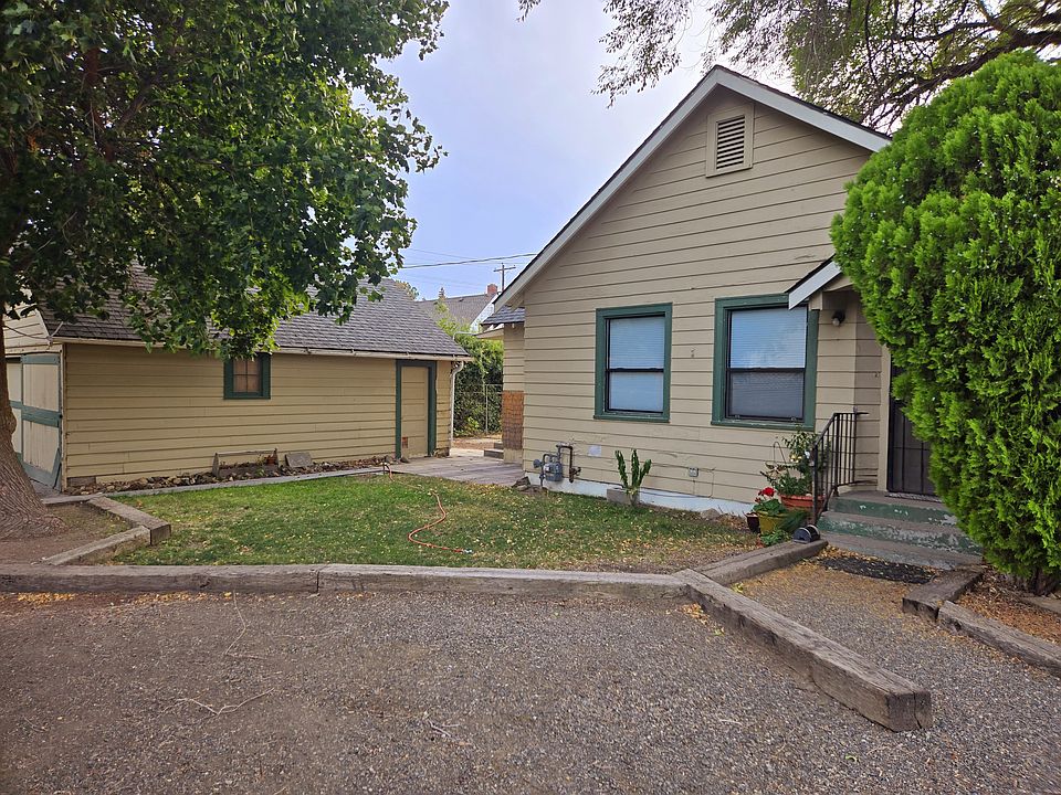 Front entry, parking, detached garage & patio