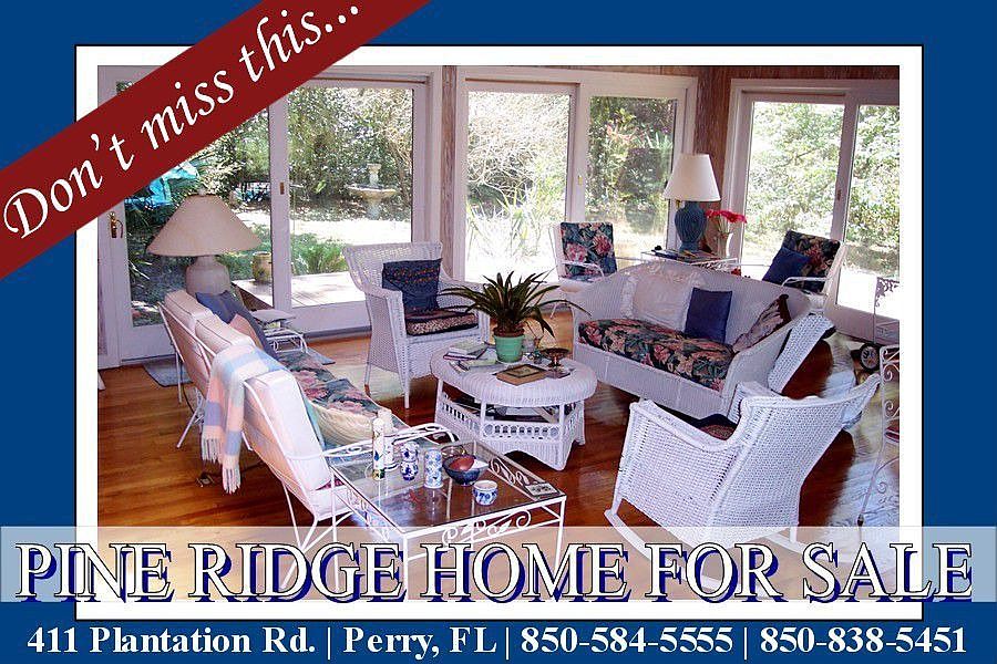 Gorgeous Sun-Room Surrounded by Six Wood Sliding Anderson Doors