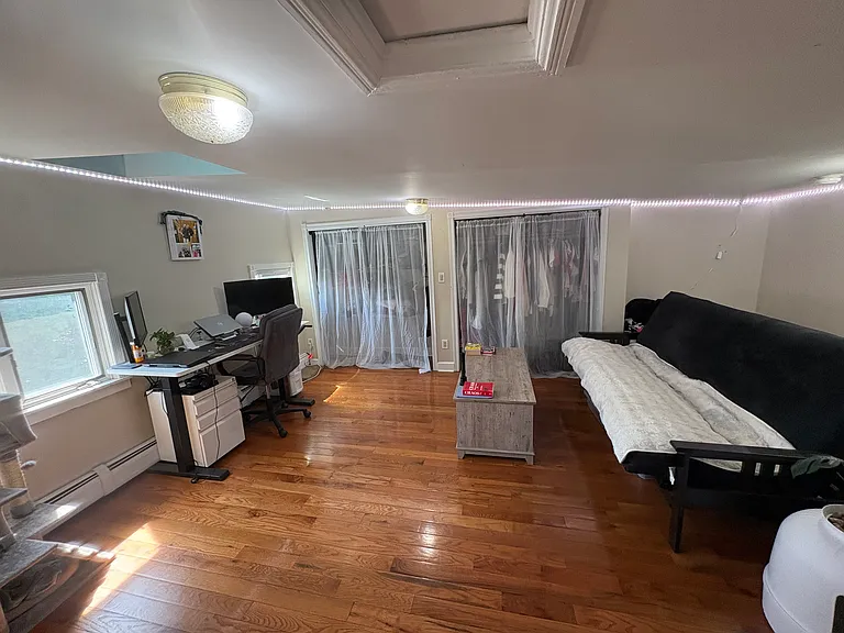 the 3rd floor loft/ office space. You could have 3 offices in this house. There is a skylight for natural light.