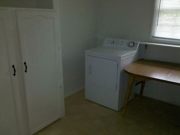 Laundry room w storage 