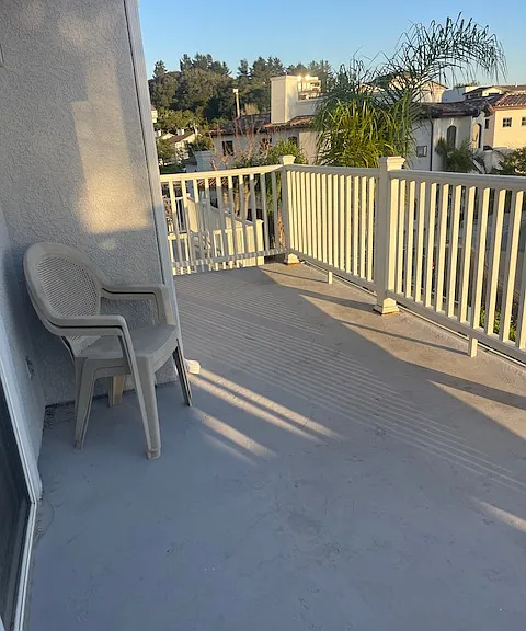 Deck with plenty of room for a BBQ and patio table