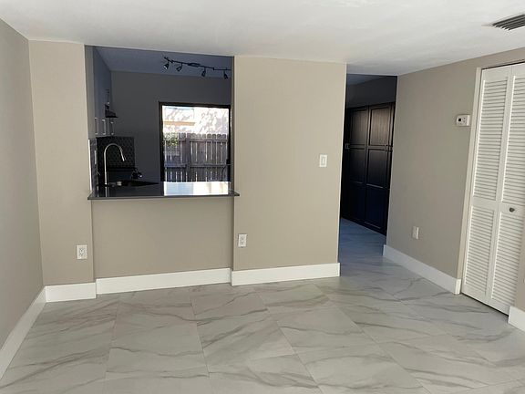 Dining room area with convenient pass-through to kitchen.