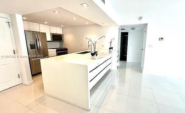 1st image of 3625 N Country Club Dr APT 1003