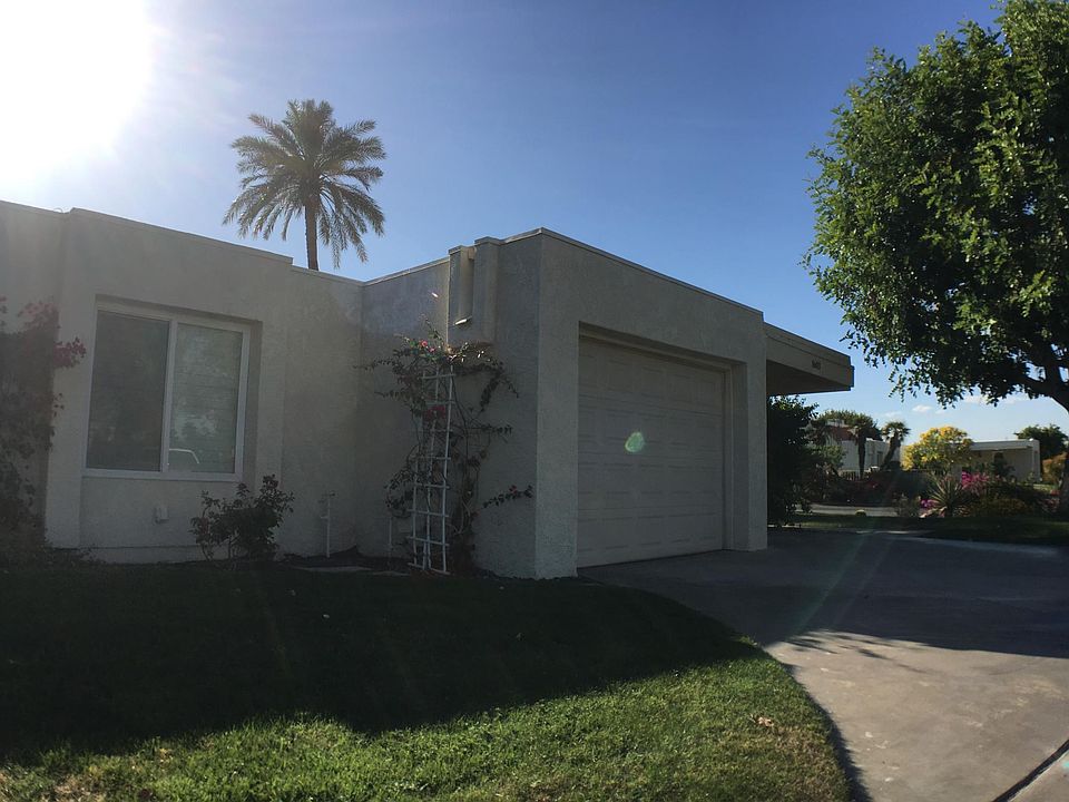 Garage, carport and driveway provide ample parking space.