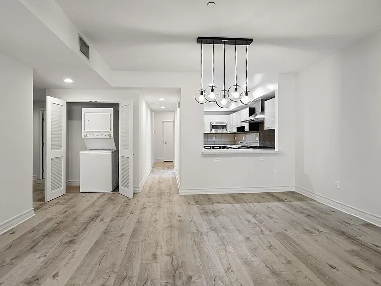 Open-Concept Kitchen and Dining Space and In-Suite Washer & Dryer