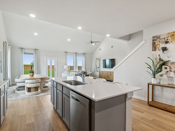 Kitchen in the Winters home plan by Trophy Signature Homes - REPRESENTATIVE PHOTO