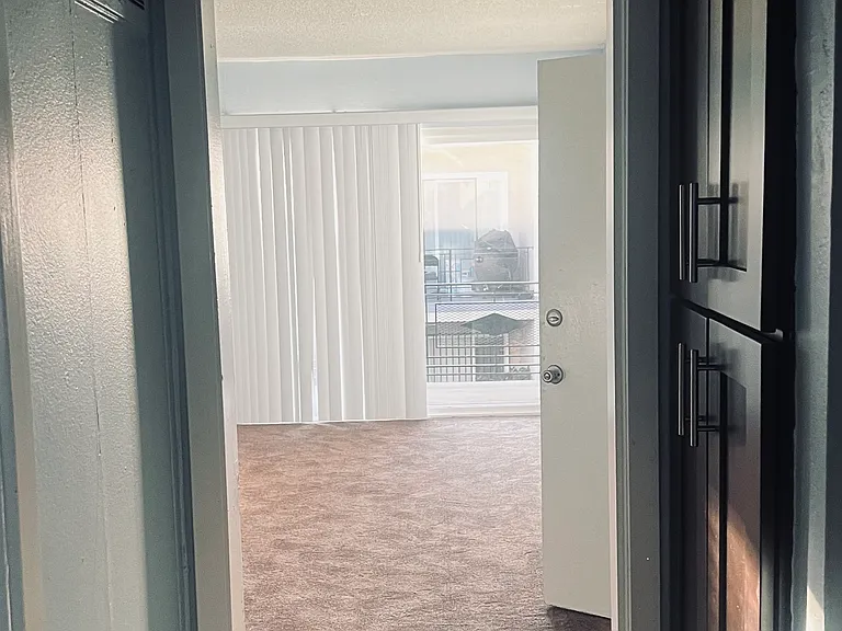 Hallway from bathroom to living room