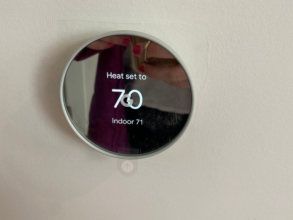Google nest thermostat. Syncs to your phone. Control temp, turn on and off remotely too.