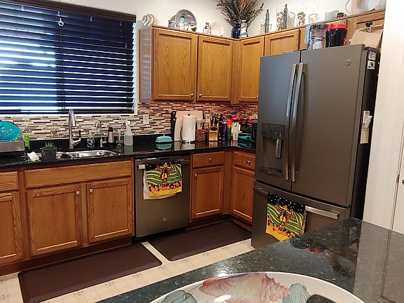 5th image of 9132 E Auburn St