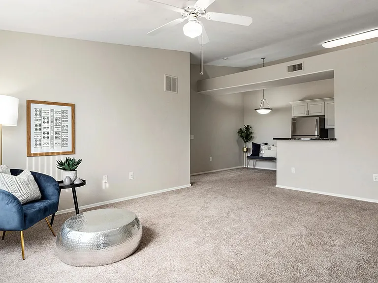 Open living rooms invite cherished moments, fostering connections within spacious interiors.