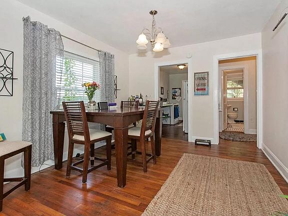 Kitchen on left, hallway to bathroom and bedrooms on right
