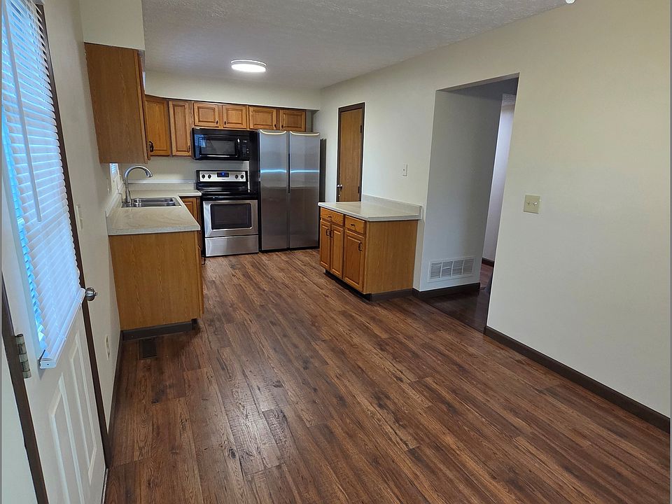 kitchen, stainless steel appliances, newer cabinets.
Photo taken from dining area