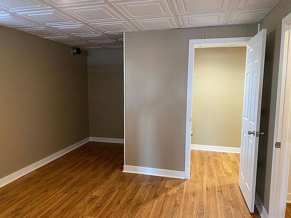 Bedroom - New Flooring, Paint, Trim, Doors