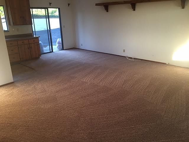 Living room, kitchen, and dining area