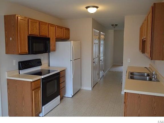 Extra wide hallways. Garage to left. Bedroom to right. Living room and entry straight ahead
