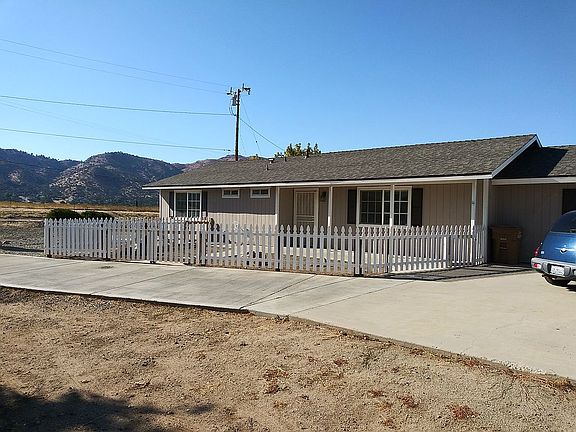 fenced area in front.