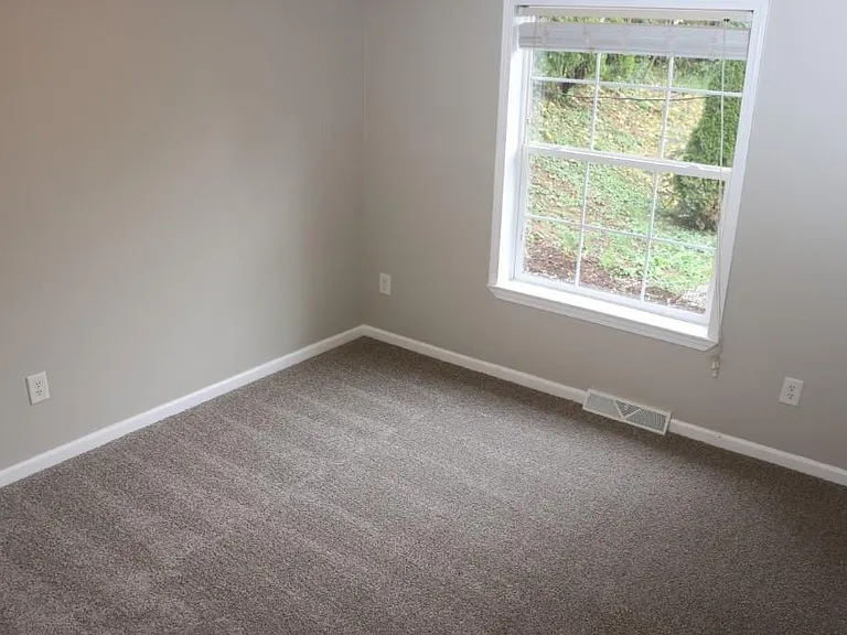Bedroom 1 of Unit B - new carpeting in all bedrooms