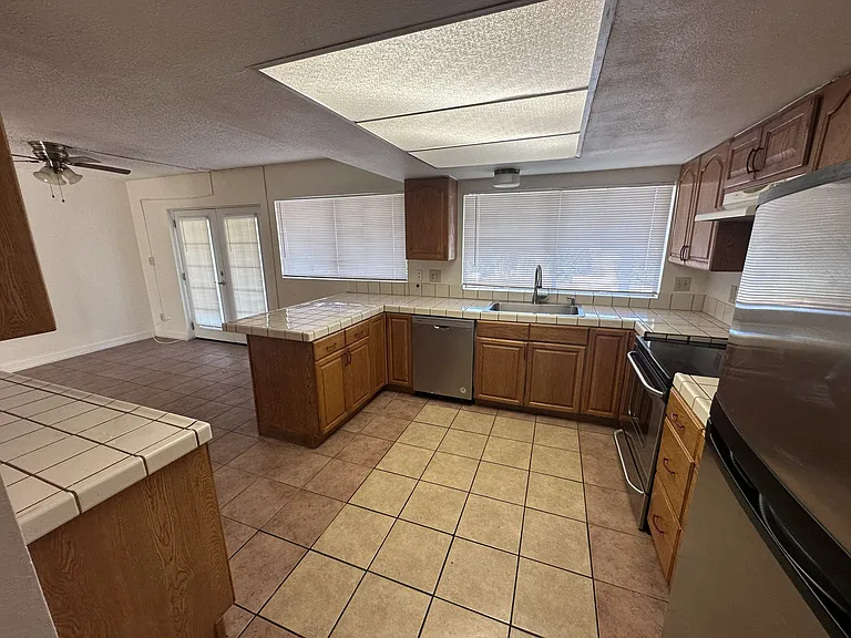 Kitchen - Storage and stainless steel appliances