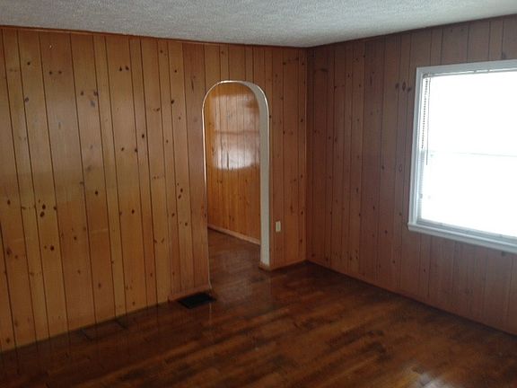 Living room with beautiful wood work throughout !