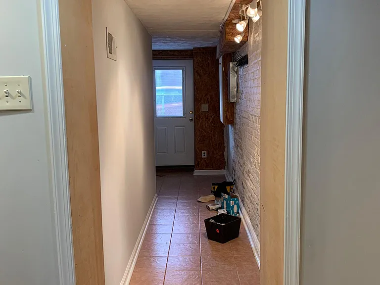 Looking out towards the entry door from inside