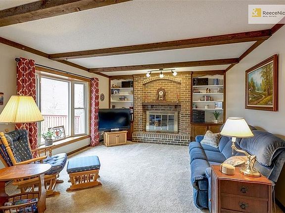 Spacious Family Room; opens to Kitchen; walks-out to deck