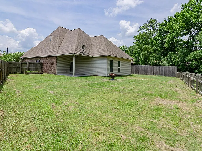 Large fenced backyard area