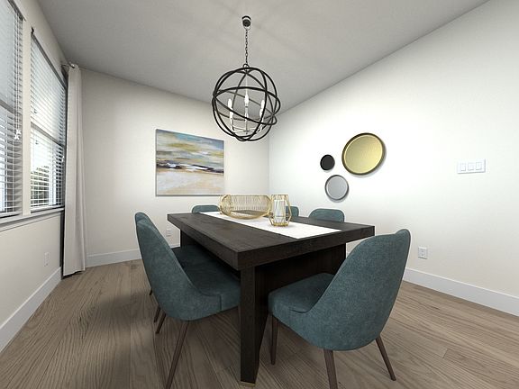 The open-concept floorplan allows for an easy flow between the kitchen and dining areas.