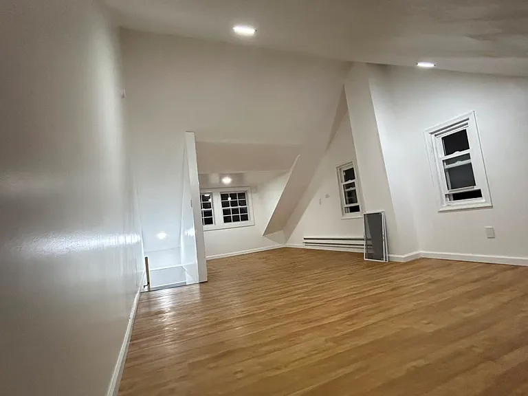 Spacious and airy attic with natural light. Can be used as 4th room