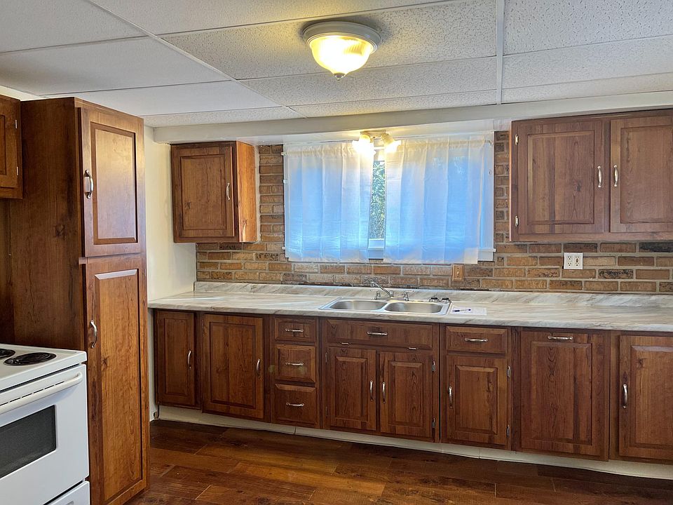 Kitchen featuring large amount of storage