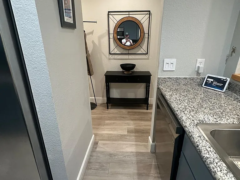 looking from kitchen into hallway to get to living room or front door