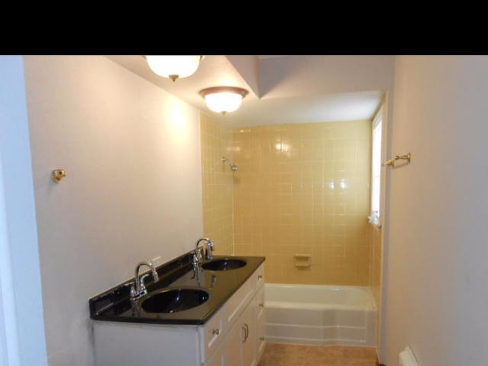 newly remodeled bathroom with his and her sinks
