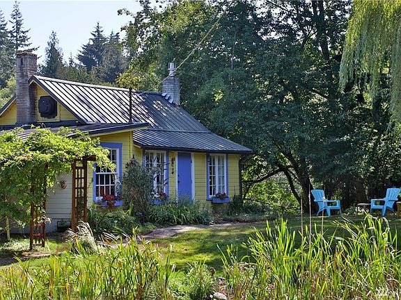 Set on a pretty, sunny 12 +/- acre parcel.