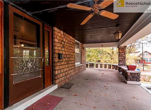 Huge wrap-around porch has commanding
