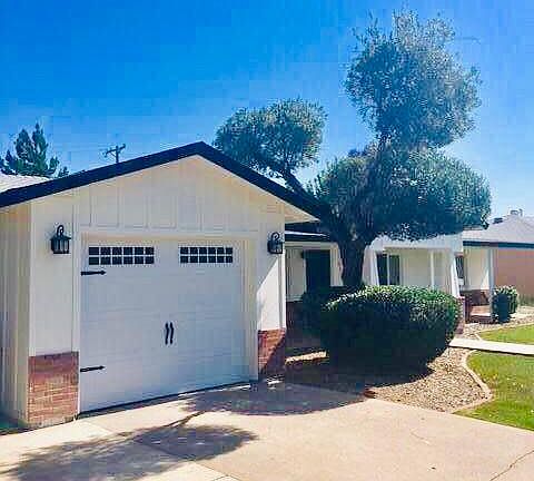 Large Garage. Plenty of storage within it. Also, parking to the side of the garage (extra wide driveway).
