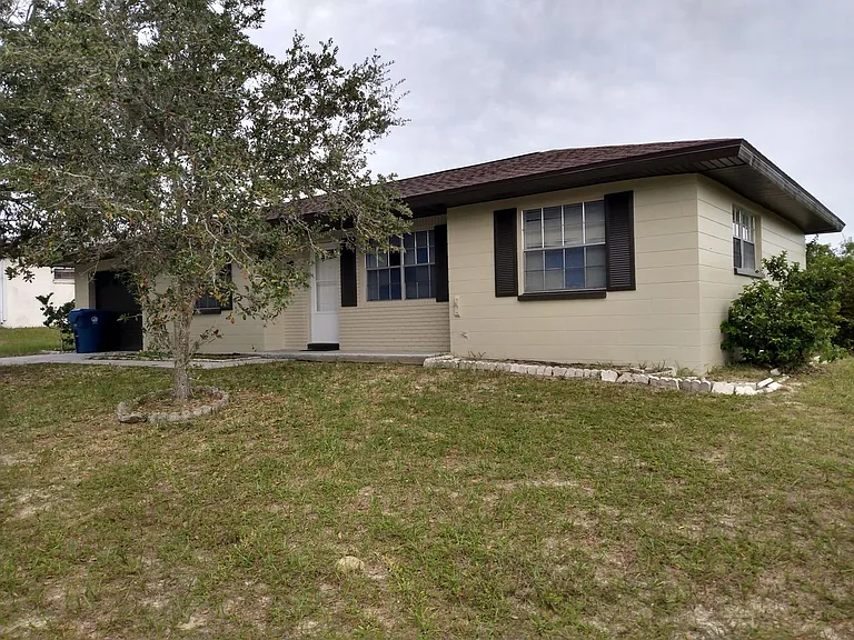 5076 Wellington Rd — Photo 2
